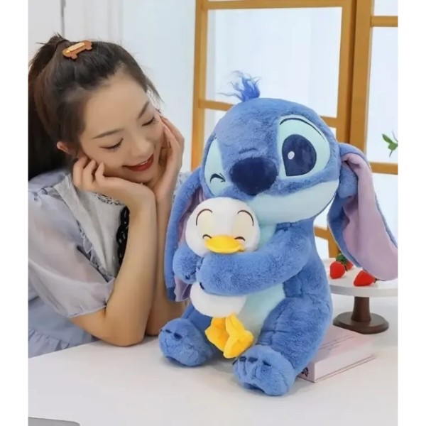Фото - М'яка іграшка STITCH Стич з качкою 40 см (6928270764696)
